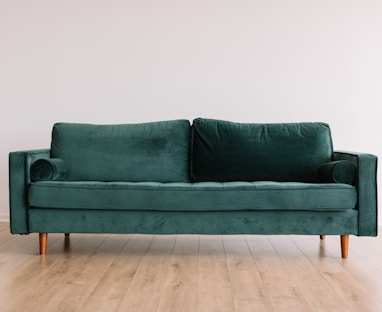 green fabric sofa