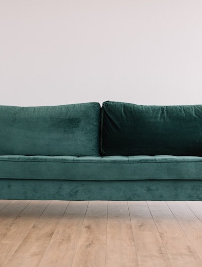 green fabric sofa