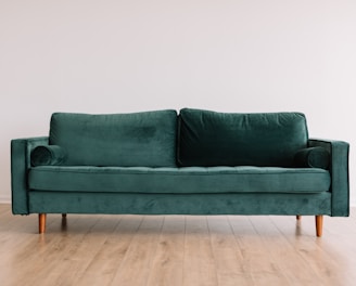 green fabric sofa