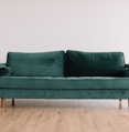 green fabric sofa