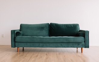 green fabric sofa