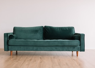 green fabric sofa