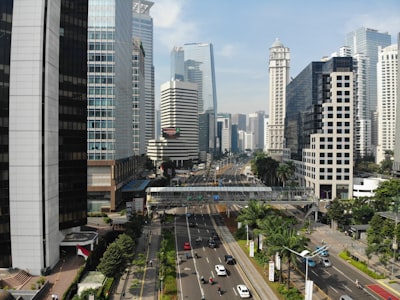 vehicle beside concrete building during daytime indonesia zoom background