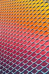 Before and after slider showing a worn chain-link fence replaced by a fresh vinyl fence.