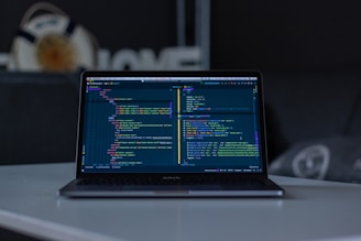 turned-on grey laptop computer