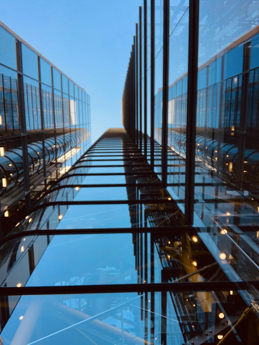 bottom view photography of curtain wall building