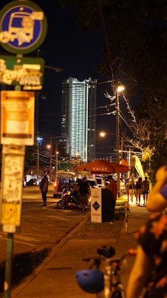 Our valet staff coordinating parking logistics under evening lights at a wedding venue.