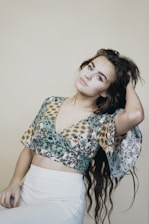 woman in gray floral dress