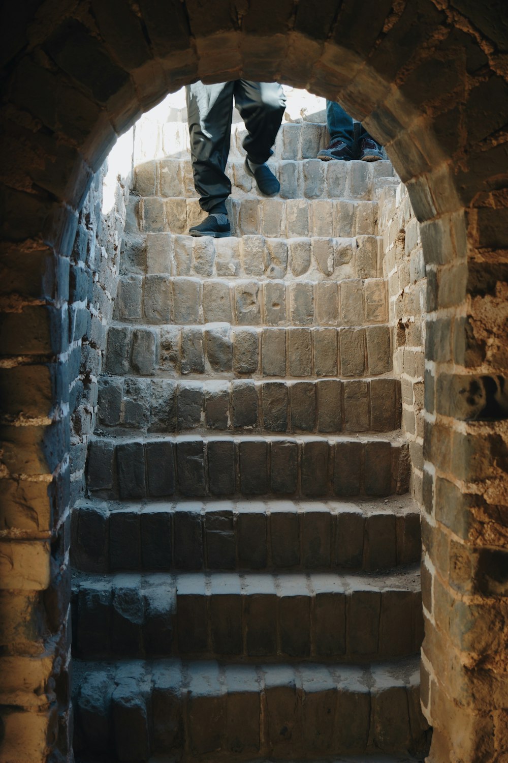 person on concrete stairs