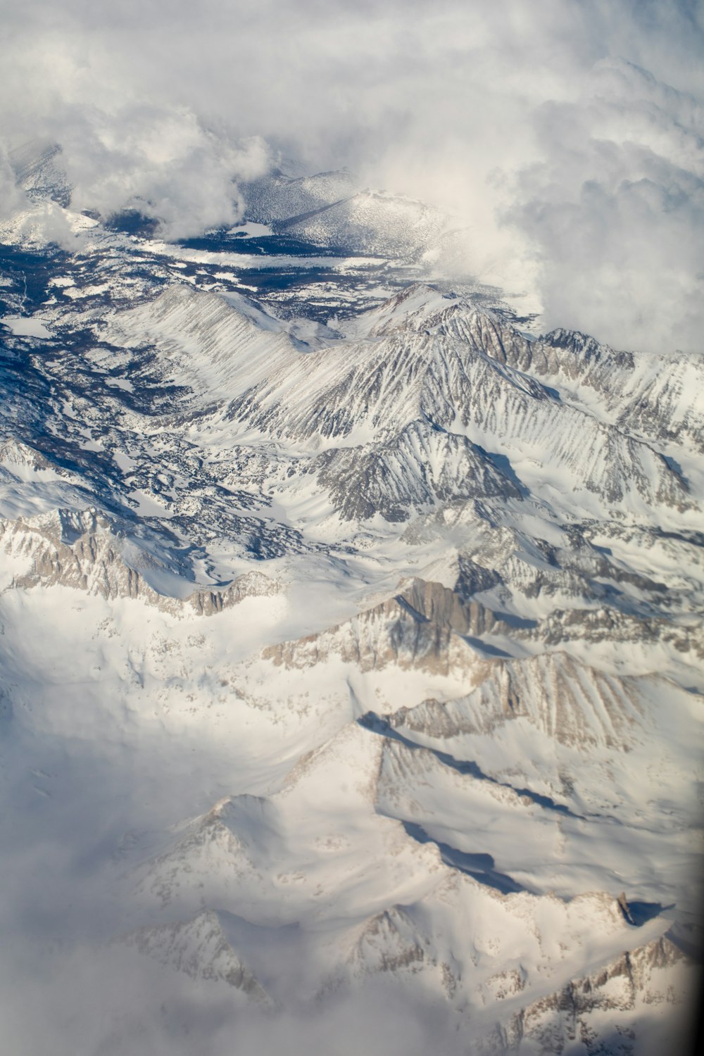 snow covered mountain during daytime