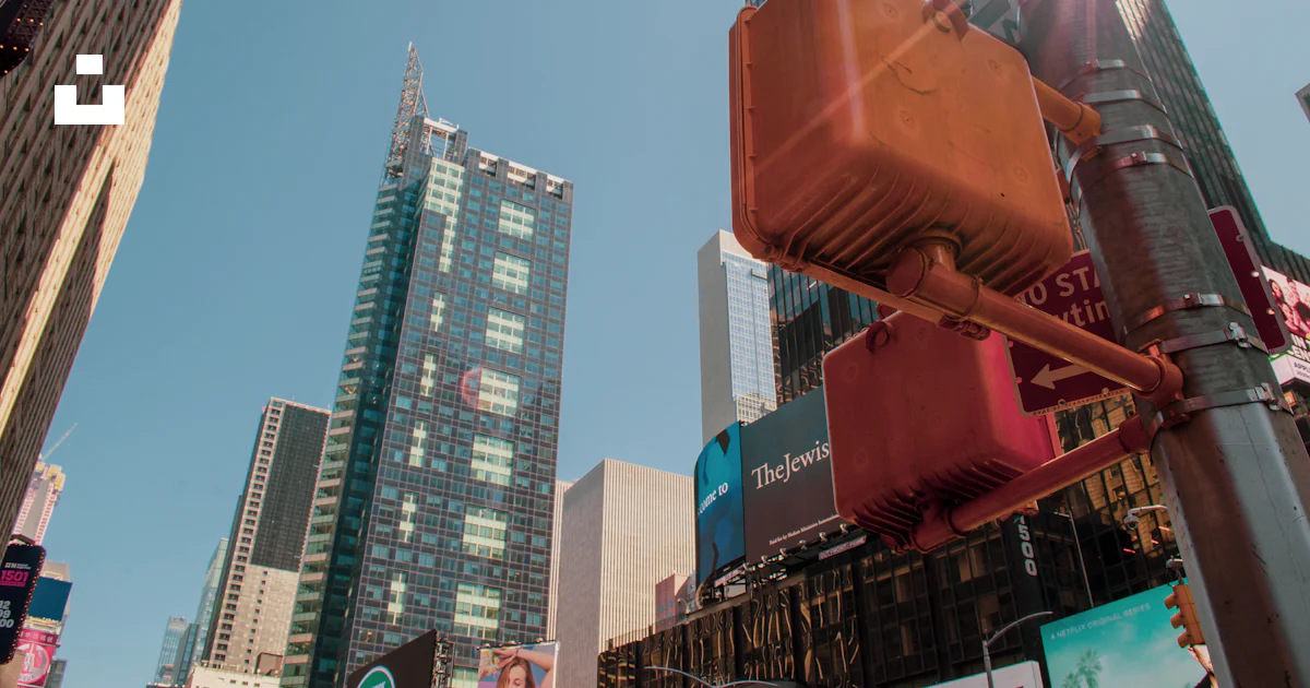 80 Sign High Rise Traffic signs near high-rise buildings photo – Free Light Image on Unsplash
