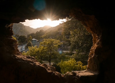 cave during sunrise pleasant teams background