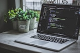 turned-on gray laptop computer
