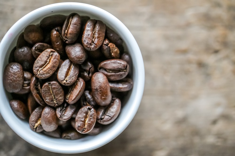 a cup full of coffee beans