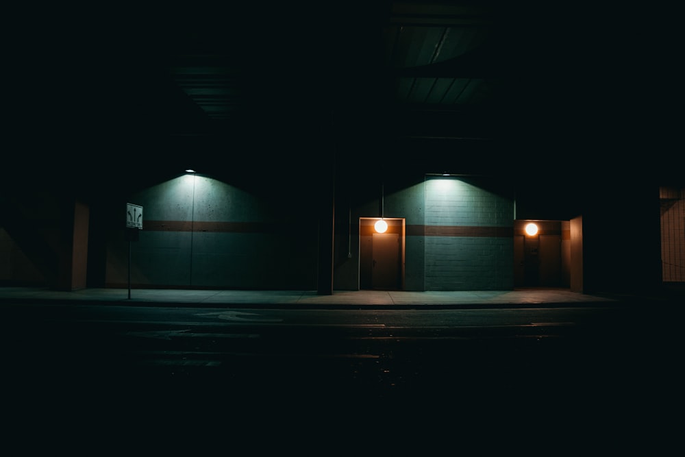 lighted wall lamp on building