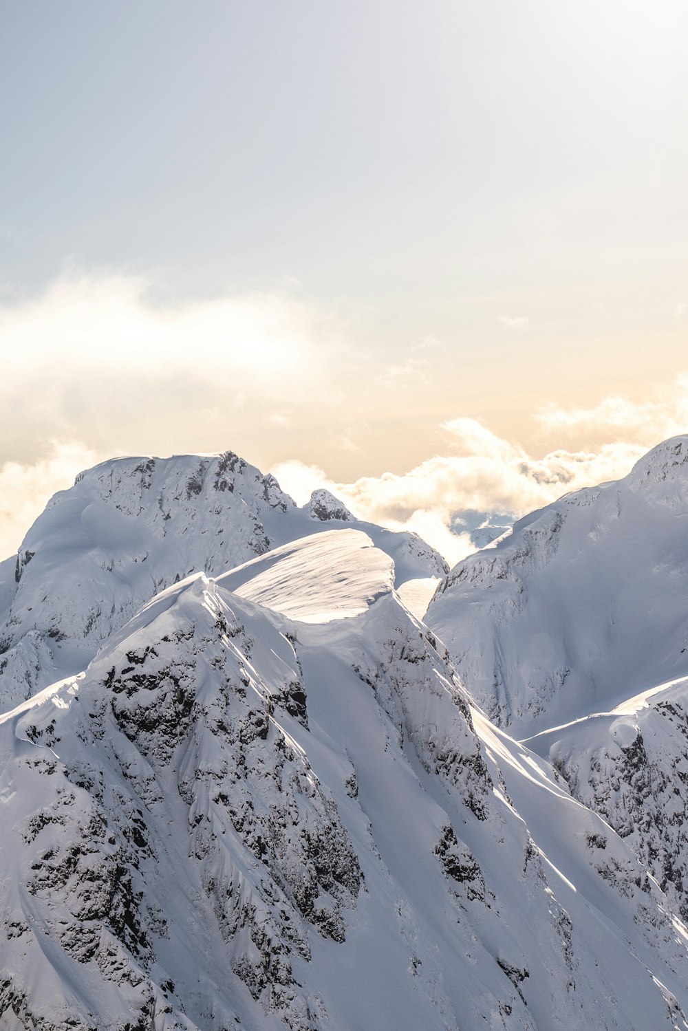 mountains covered by snow at daytime