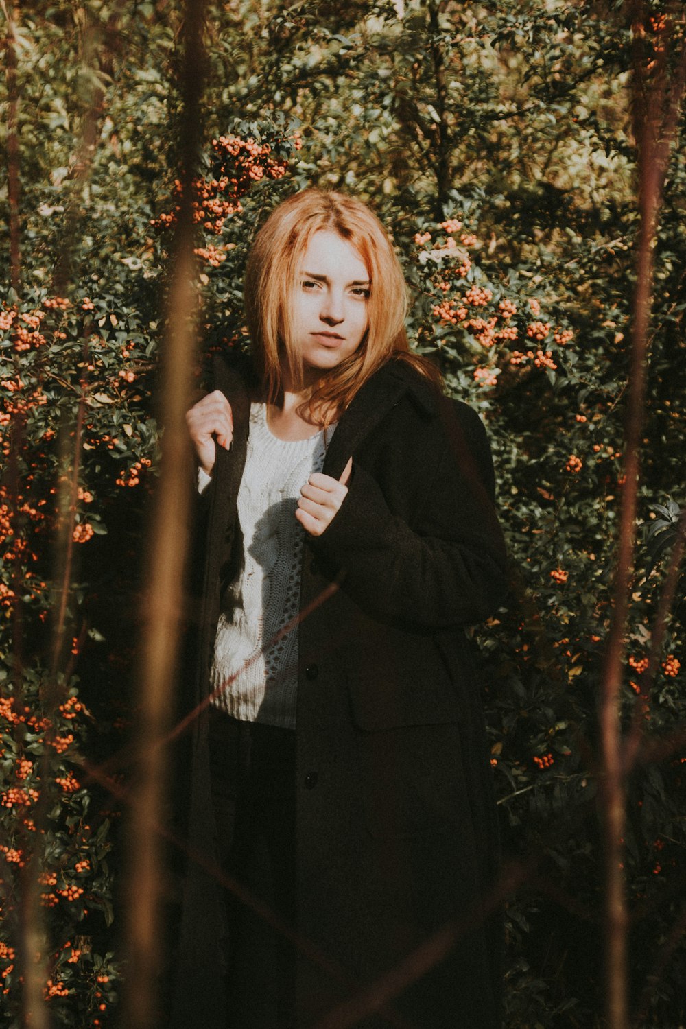 woman wearing black coat