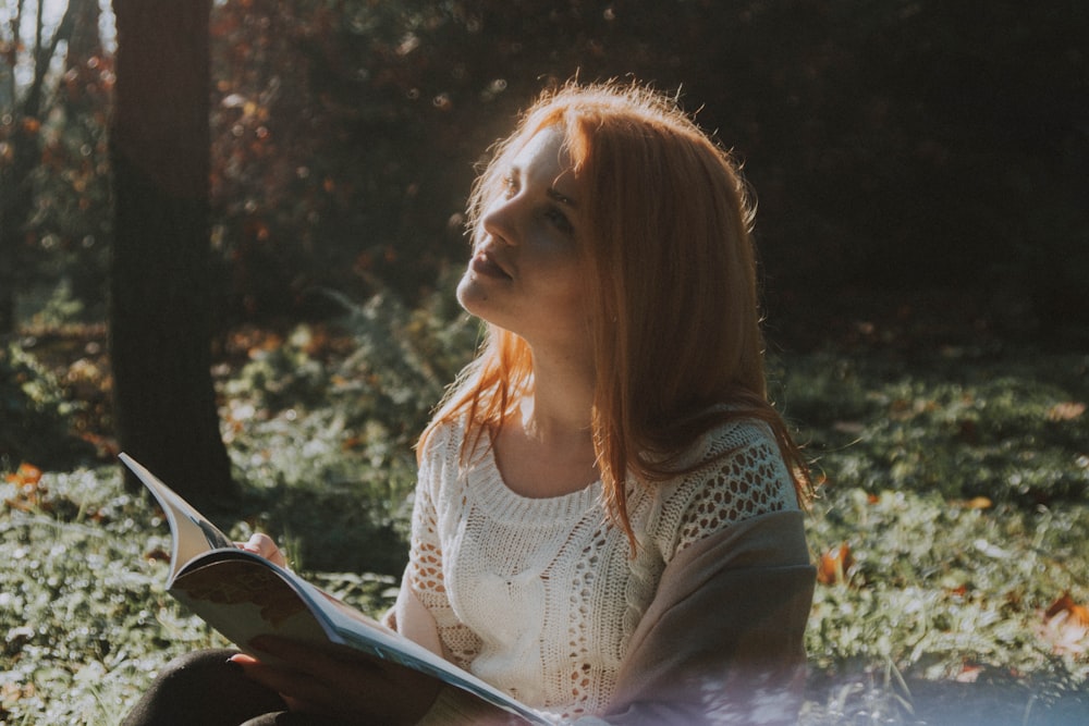 woman holding book