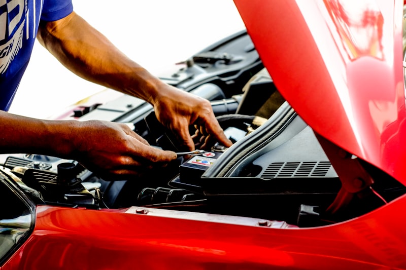 Mechanic inspecting a used vehicle