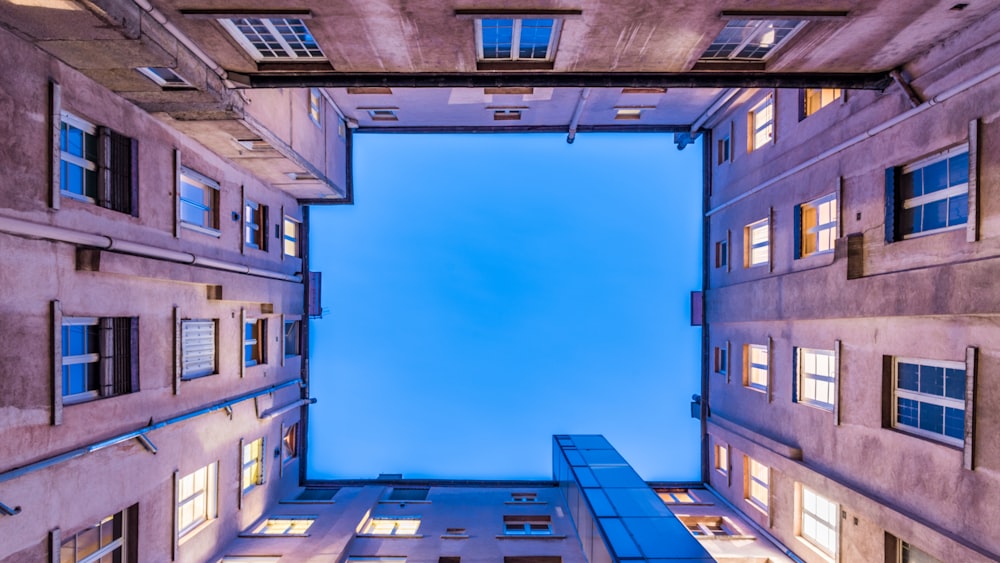 low-angle photography of white building