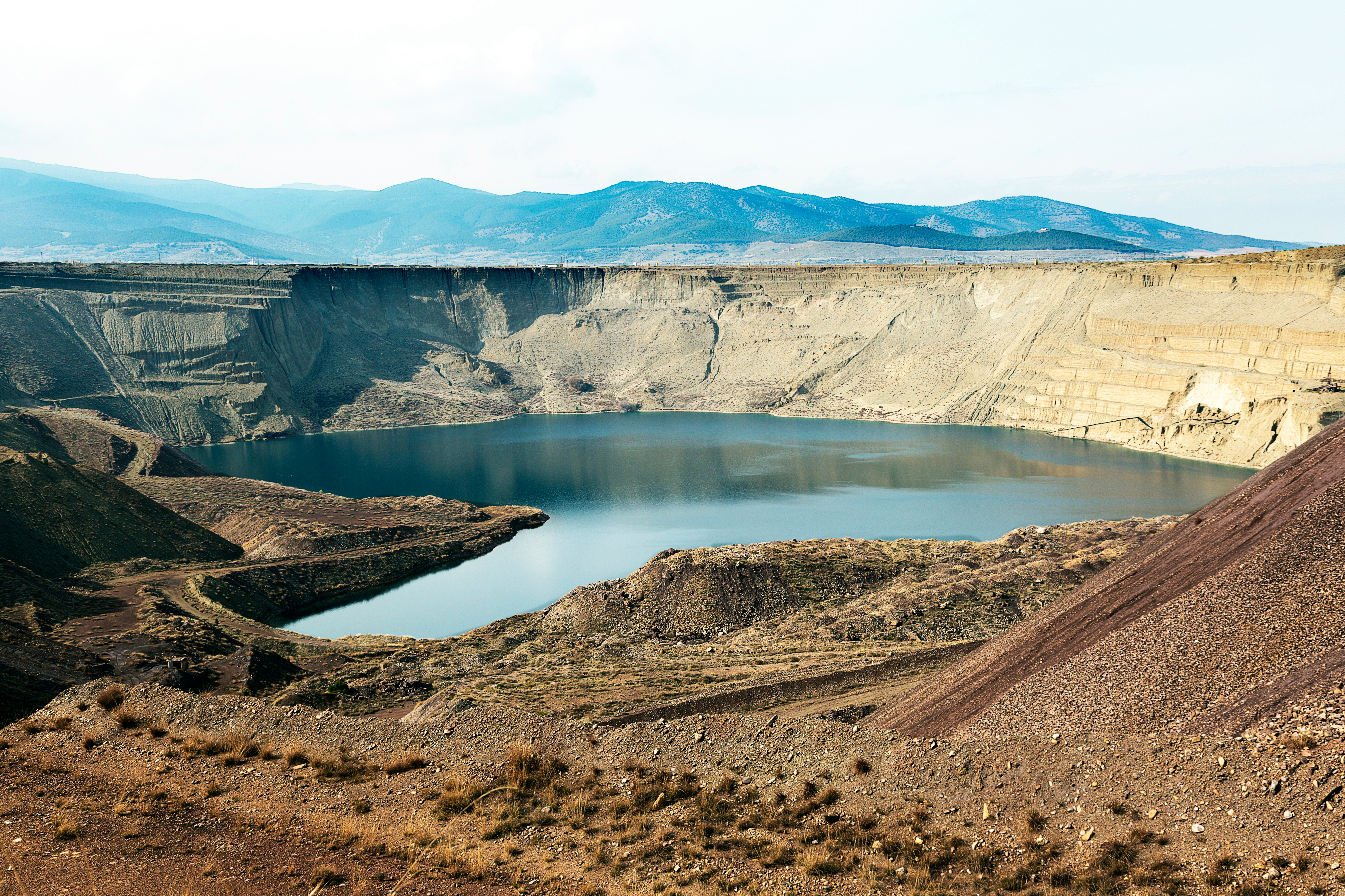 landscape photography of lake under blue sky