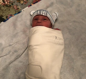 A soft, cuddly personalized plushie with a newborn's name embroidered on its chest.