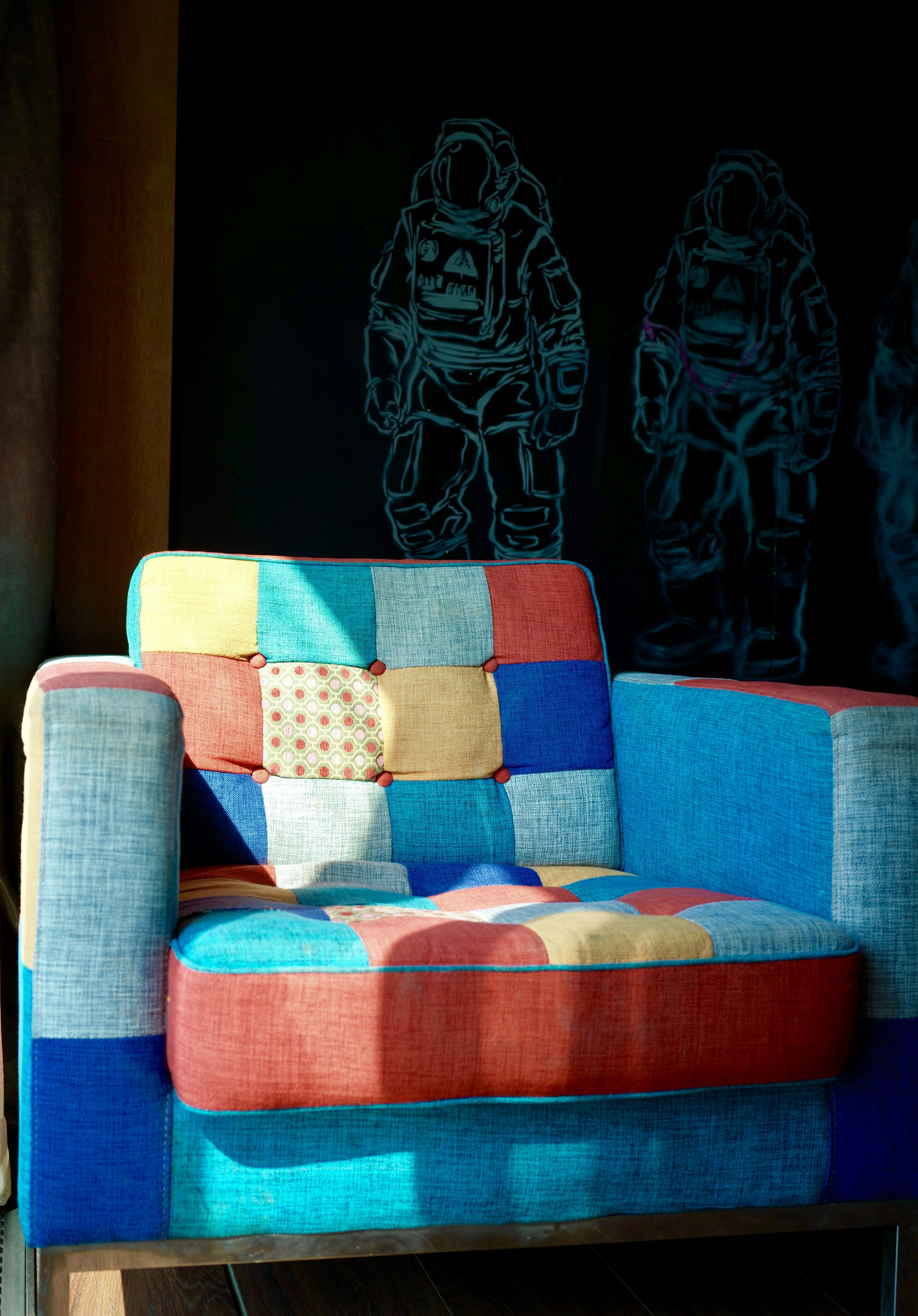multicolored sofa chair