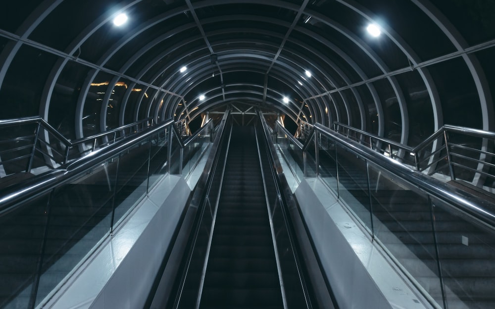 three black escalators