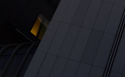 a tall building with a clock on the side of it