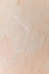 a close up of a wall with some paint on it