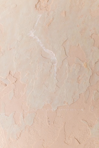 a close up of a wall with some paint on it