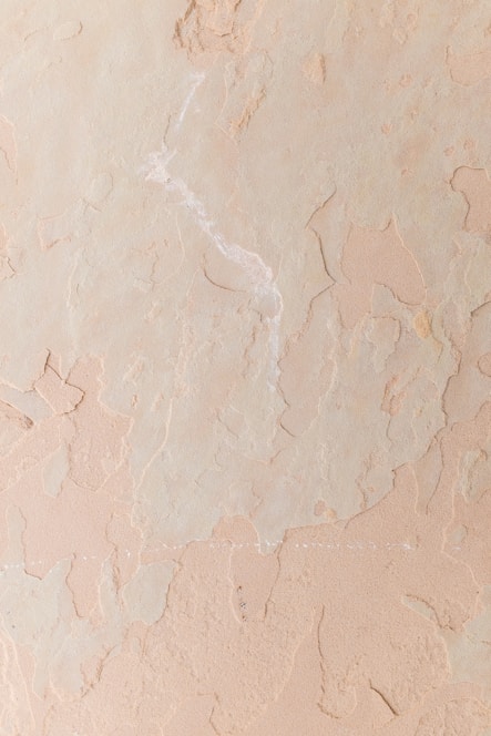 a close up of a wall with some paint on it