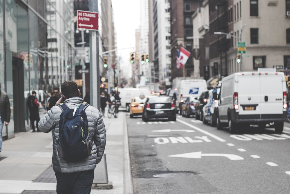 people walking beside street