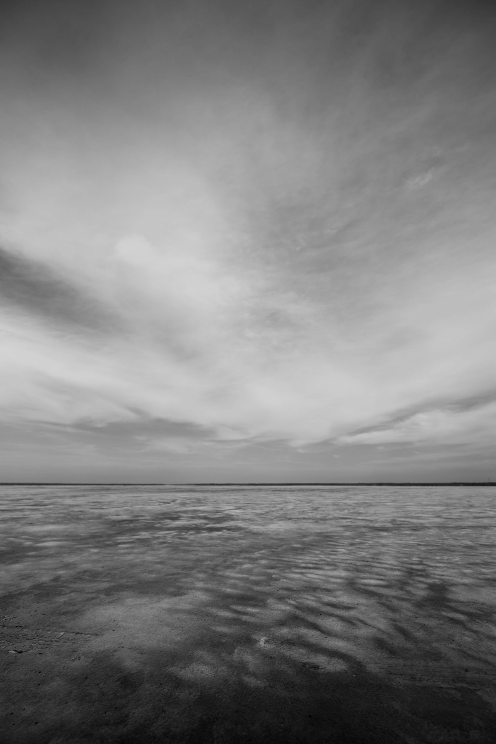 grayscale photography of calm sea