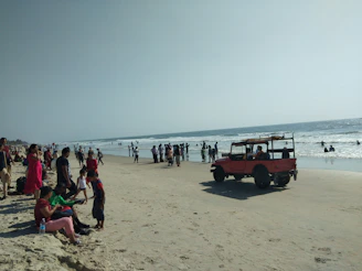 A vintage 1970s beach scene with bright colors and a family enjoying the shore.