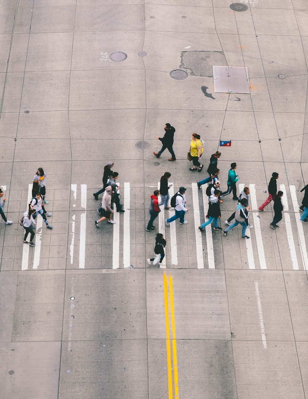 people walking on pedestrian lane