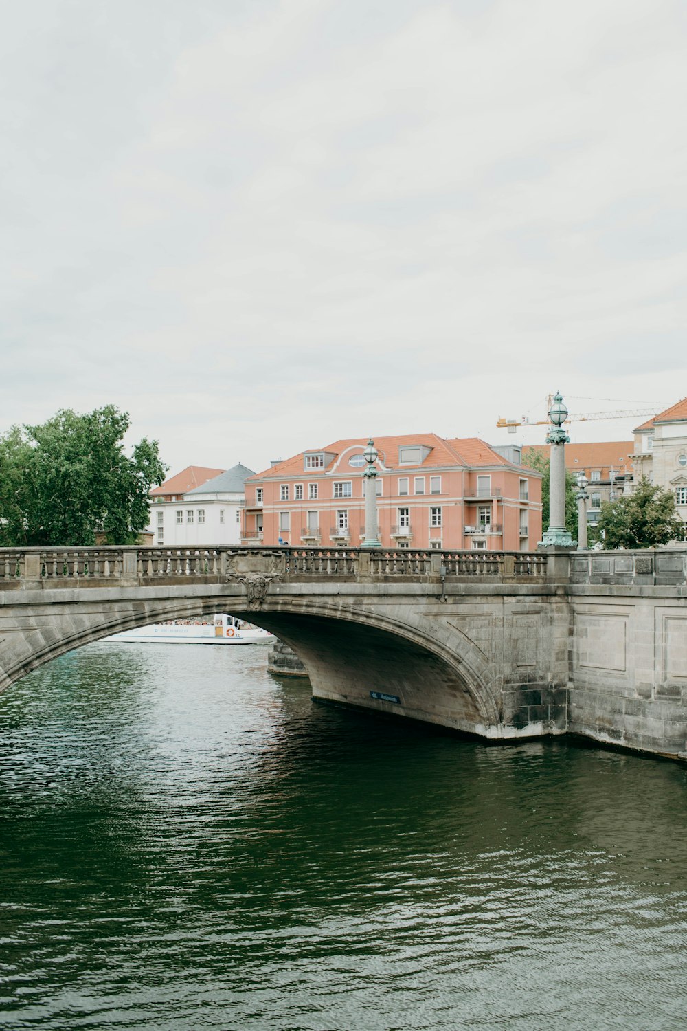 bridge over calm body of water