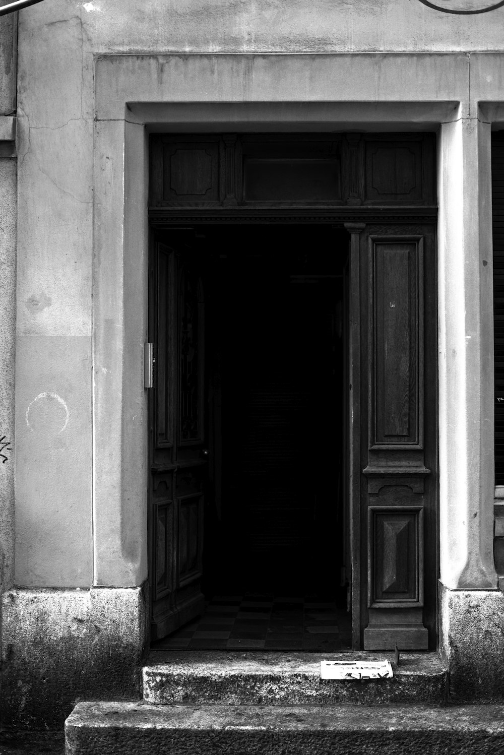 grayscale photography of door