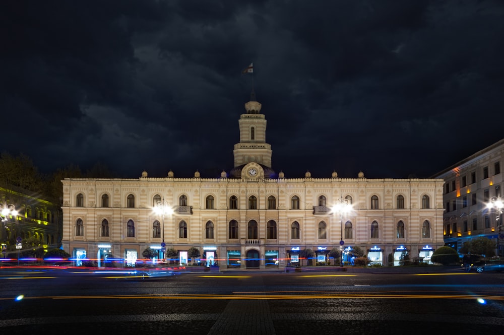 white painted concrete building at night