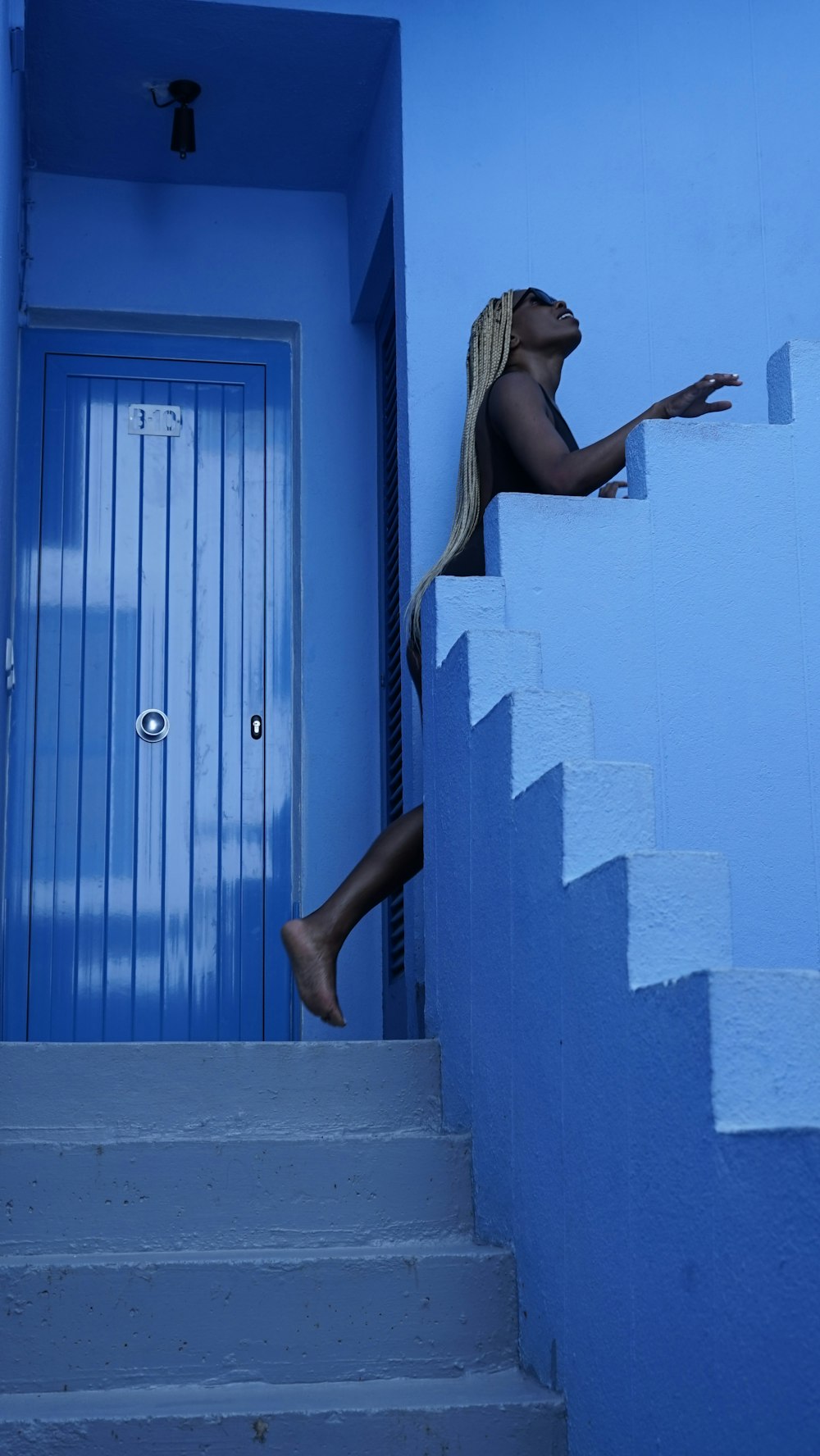 woman going upstairs