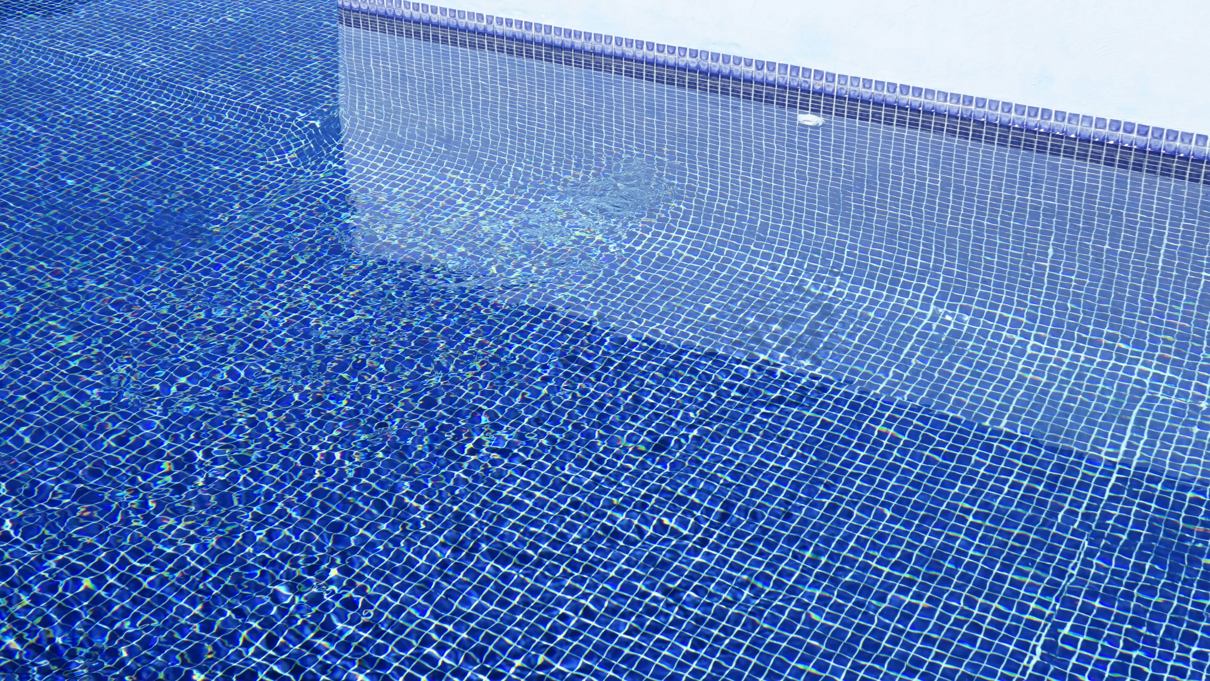 Empty pool showing wear