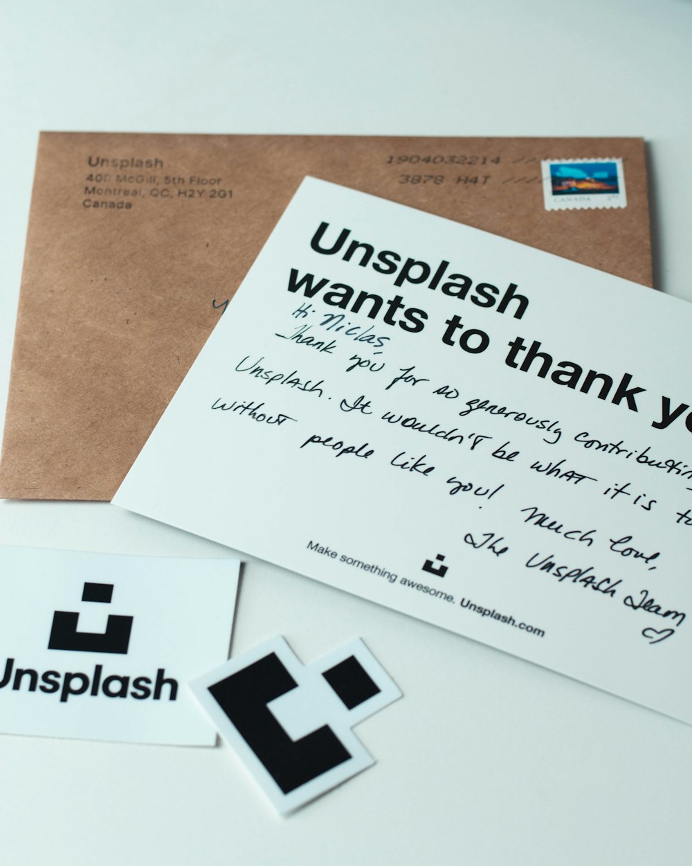 two brown and white Unsplash wants to thank you letter