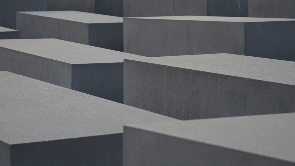 a large group of concrete blocks sitting next to each other