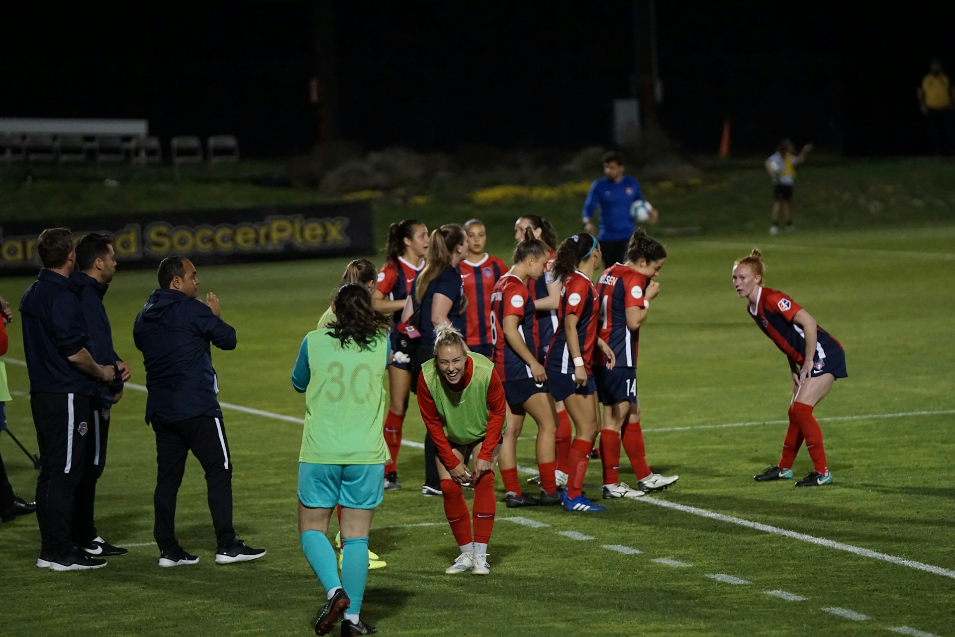 woman wearing yellow long-sleeved dress under white clouds and blue sky during daytime