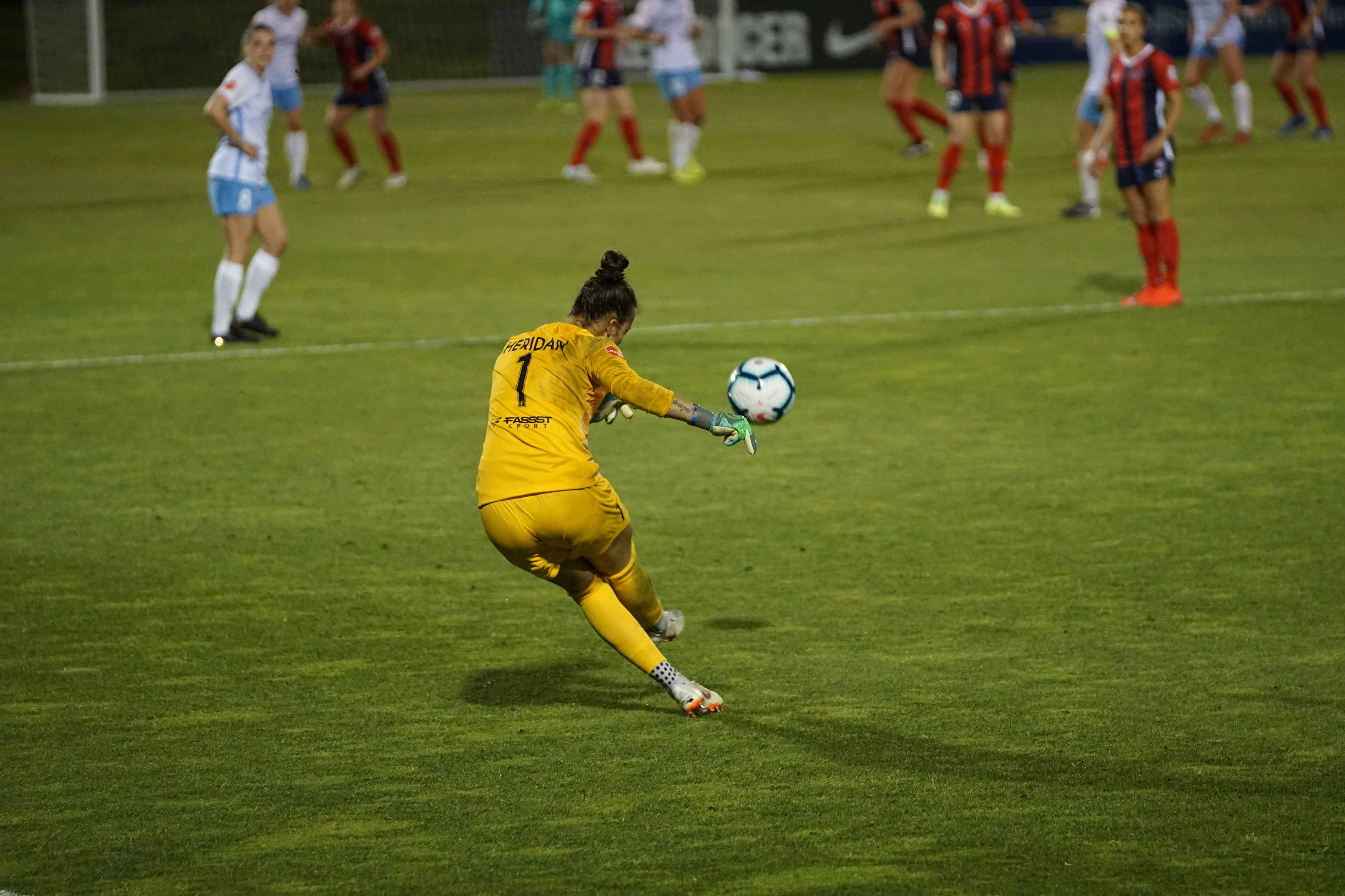 woman playing soccer