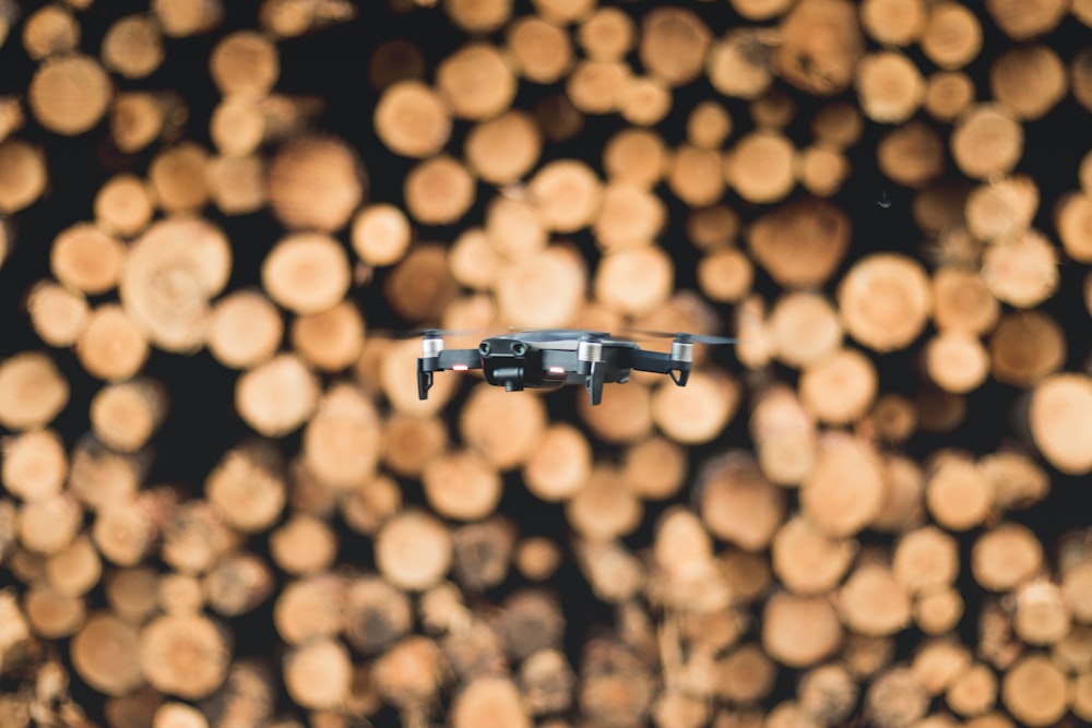 grey and black quadcopter bokeh photography