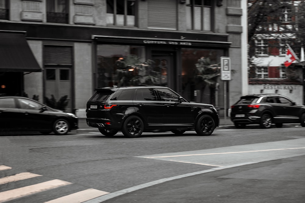 black SUV near the building