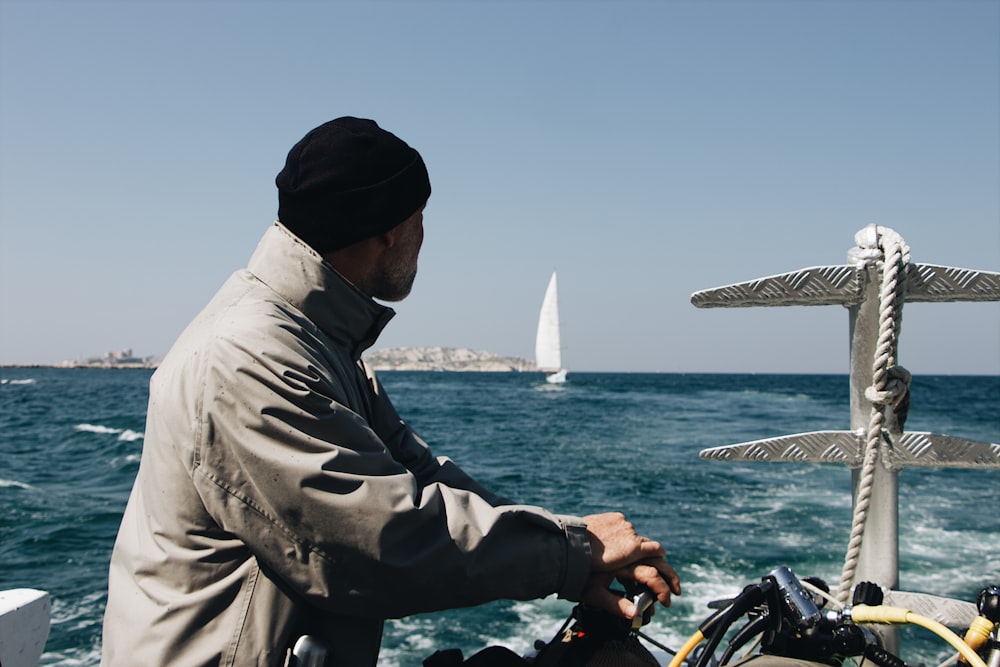 man looking at the sea