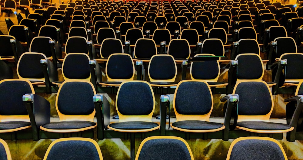 black-and-yellow stadium chairs