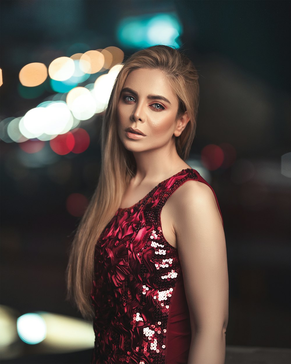 woman in maroon dress